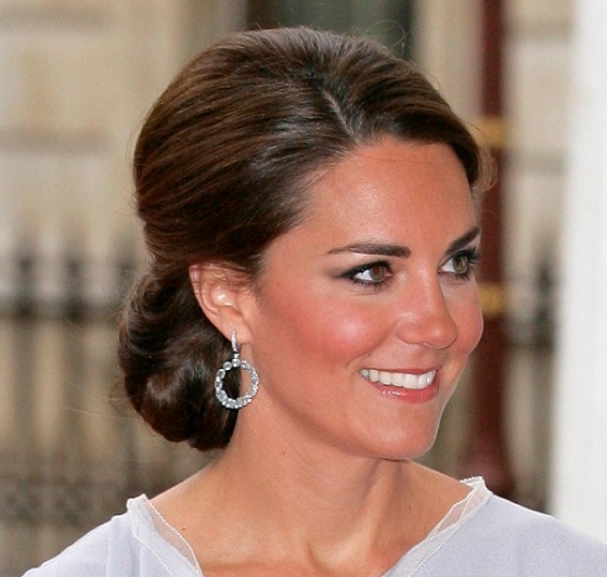 Typically we see Kate with her hair down, however, she looks just as stunning with it swept into an elegant updo. 