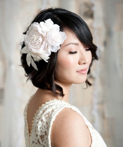 Here is an example of a bride working with her natural hair.  A slight wave nicely complements her short bob. 
